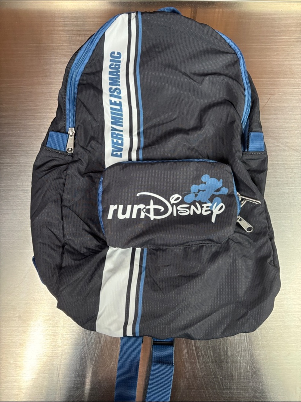 Disney RunDisney Black and Blue Backpack with White Stripe, Every Mile is Magic
